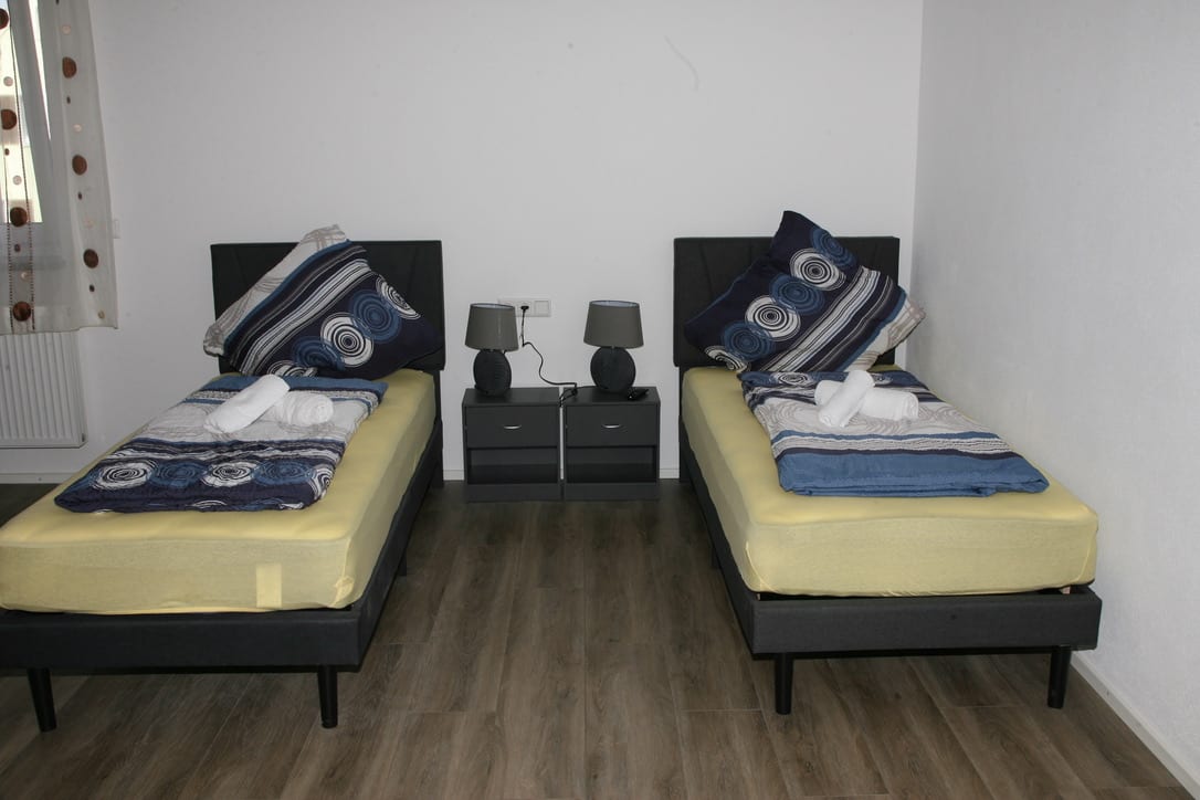 Schlafzimmer im Apartment EG Kingsize, Ferienwohnung Bad Saulgau